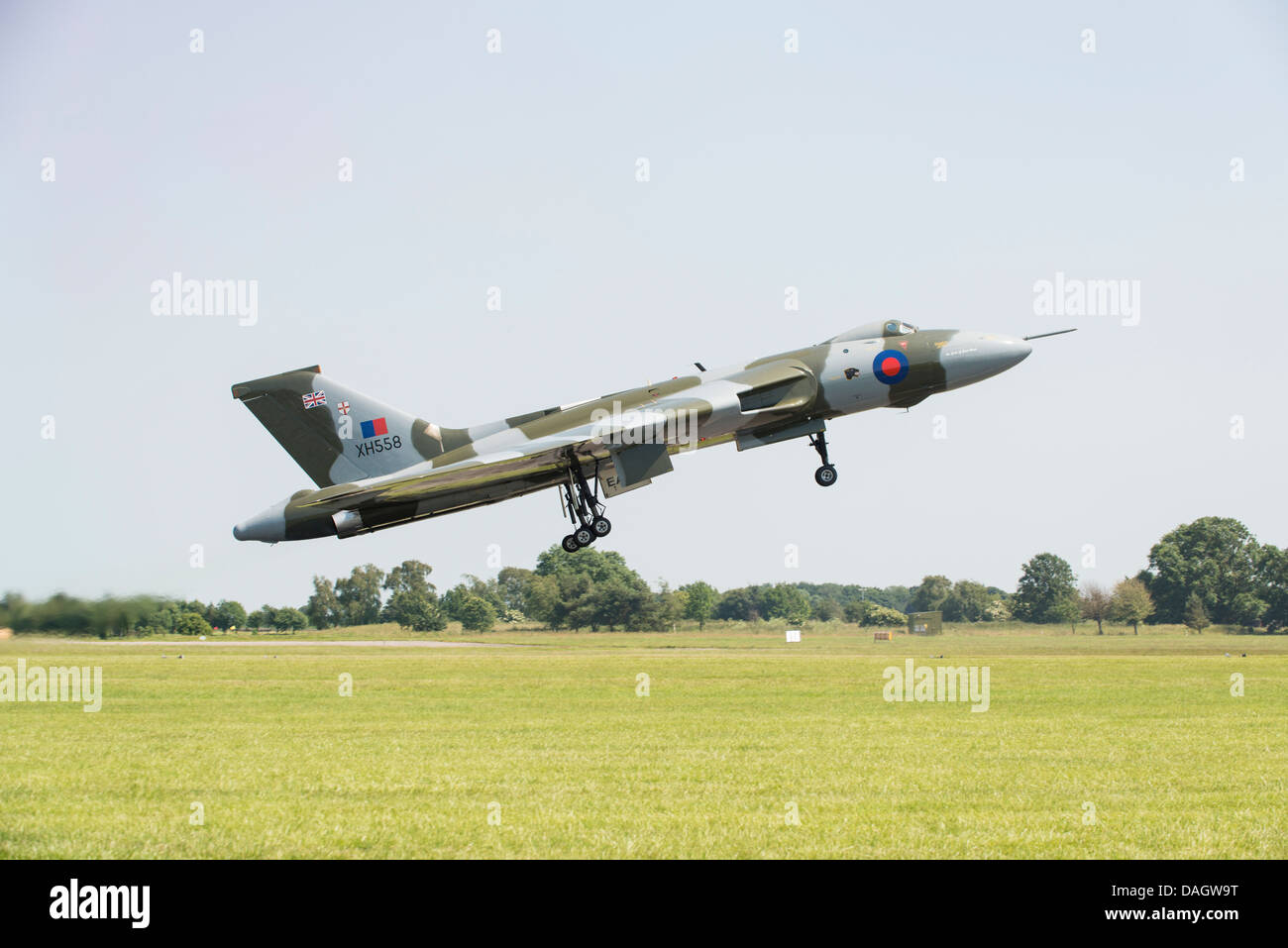 Historic British Cold War Bomber The Avro Vulcan XH558 takes off from RAF Waddington to display at the 2013 Air Show Stock Photo