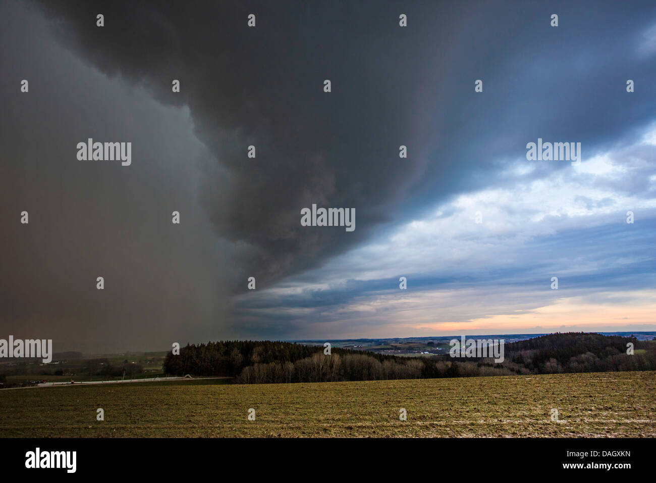 dramatical storm front with heavy rain tracking over river valley, Germany, Bavaria, Isental Stock Photo