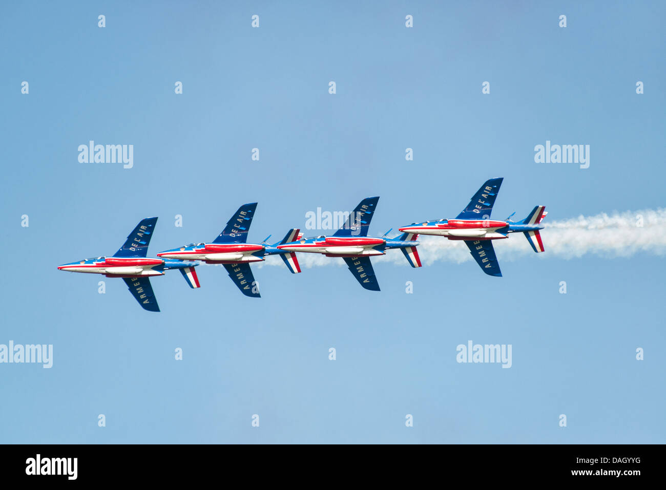 The national display team  for the French Air Force, La Patrouille de France in their Alpha Jet Es fly at the Waddington Airshow Stock Photo