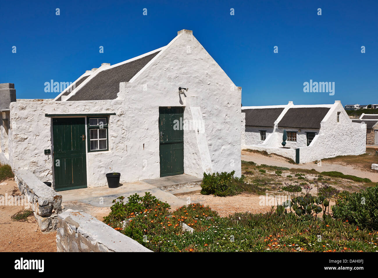 white washed reed thatched roof cottages in Kassiesbaai, Arniston, Cape Agulhas, Western Cape, South Africa Stock Photo