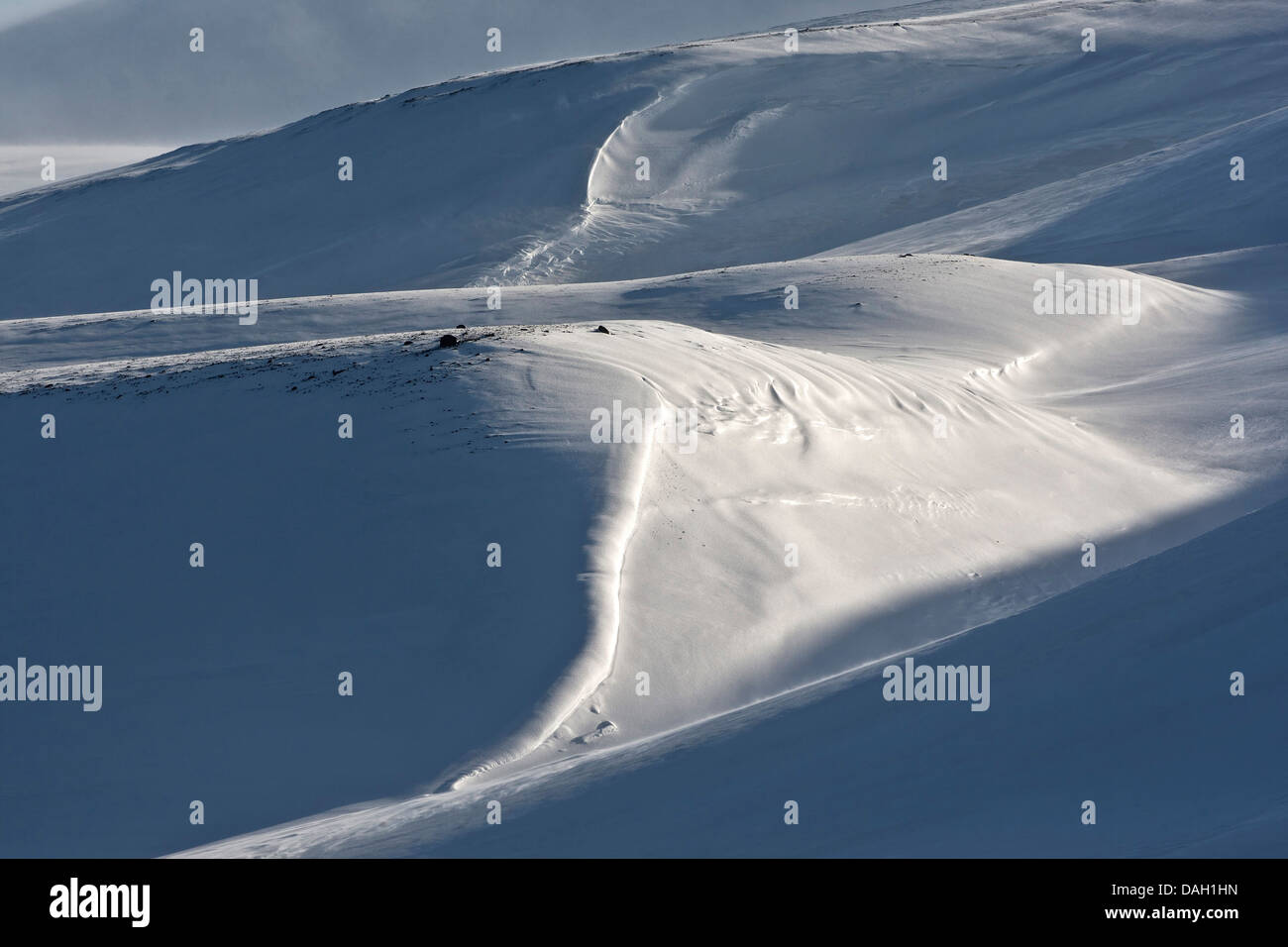 snowdrifts in hilly landscape, Iceland Stock Photo