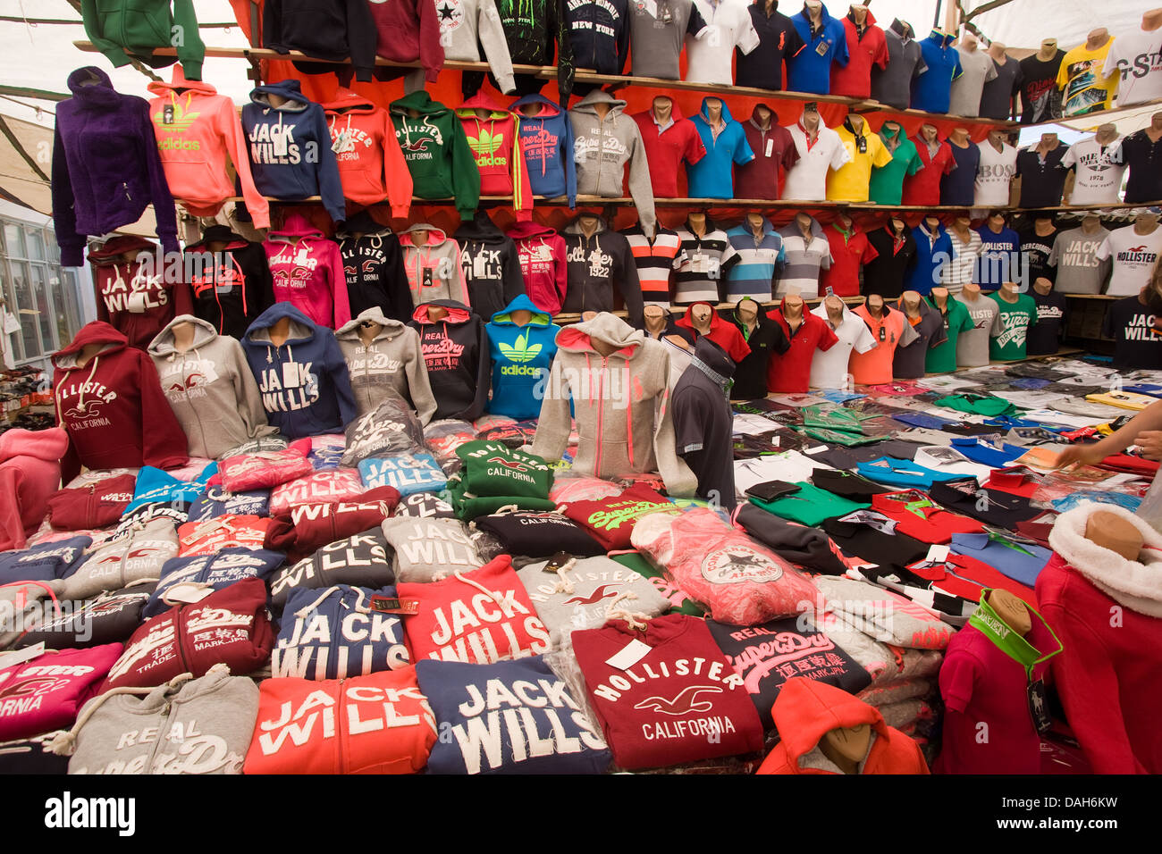 Stall in street market selling T shirts etc., Stock Photo