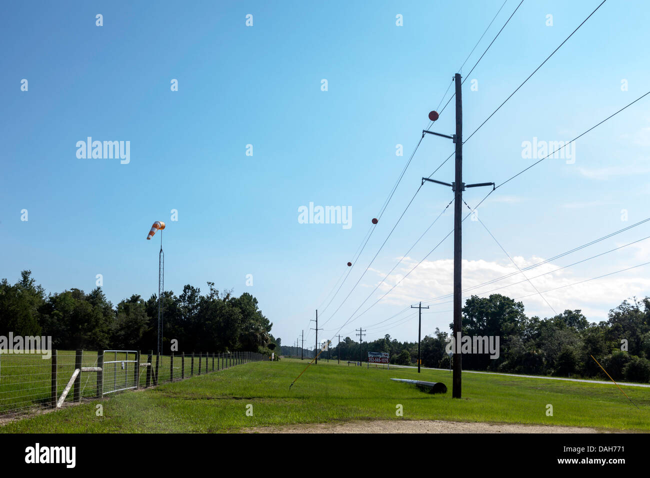 Fenced entry to rural airport serving the Cedar Key, Florida area