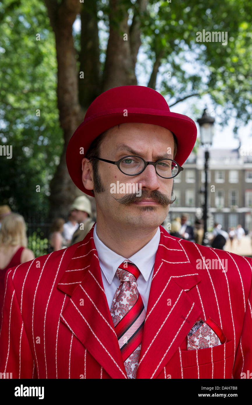 London, UK. 13 July 2013.  An elegantly gentleman waiting to enter Bedford Gardens for the start of the Chaps Olympiad.  Alamy Live News.  Photographer: Gordon Scammell/Alamy Live News Stock Photo