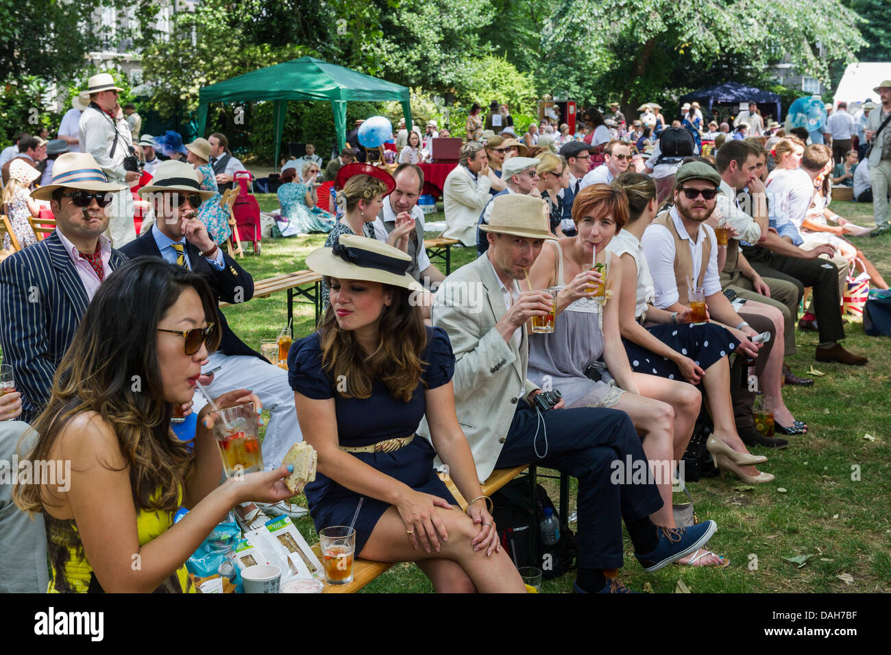 London, UK. 13 July 2013.  Spectators enjoying themselves at the Chaps Olympiad in Bedford Square Gardens in London.  Alamy Live News.  Photographer: Gordon Scammell/Alamy Live News Stock Photo