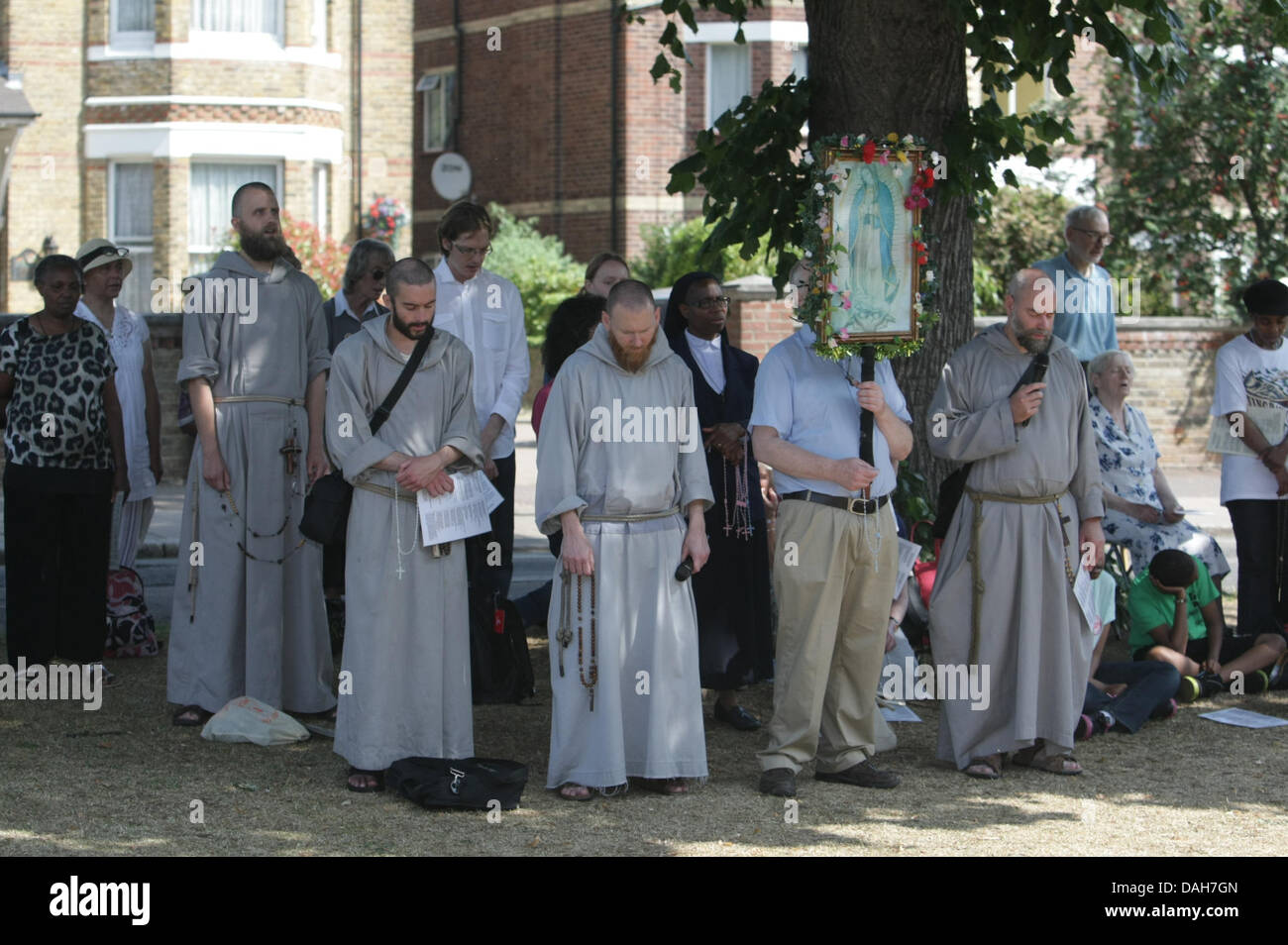 London, UK. 13th July 2013. Catholic anti abortionists praying and leafletting at the Marie Stopes Clinic in, Ealing, London, UK. 13th July 2013. Credit:  martyn wheatley/Alamy Live News Stock Photo