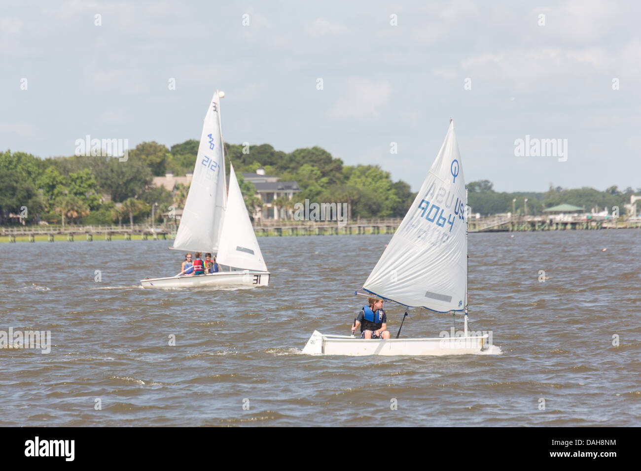 Children sail Opti dinghies at the James Island Yacht Club on