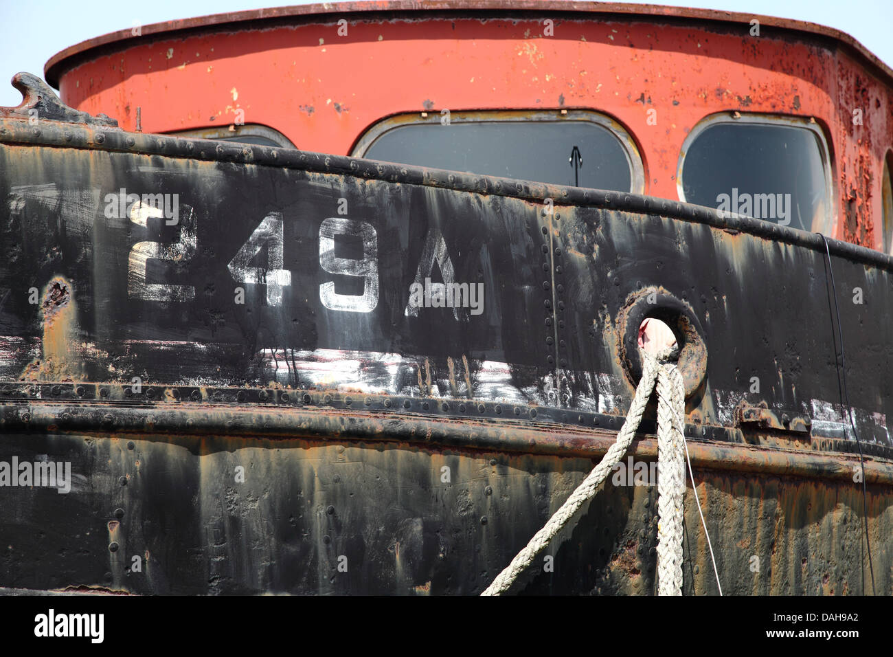 An old ship converted for use as a houseboat at Shoreham Beach Stock