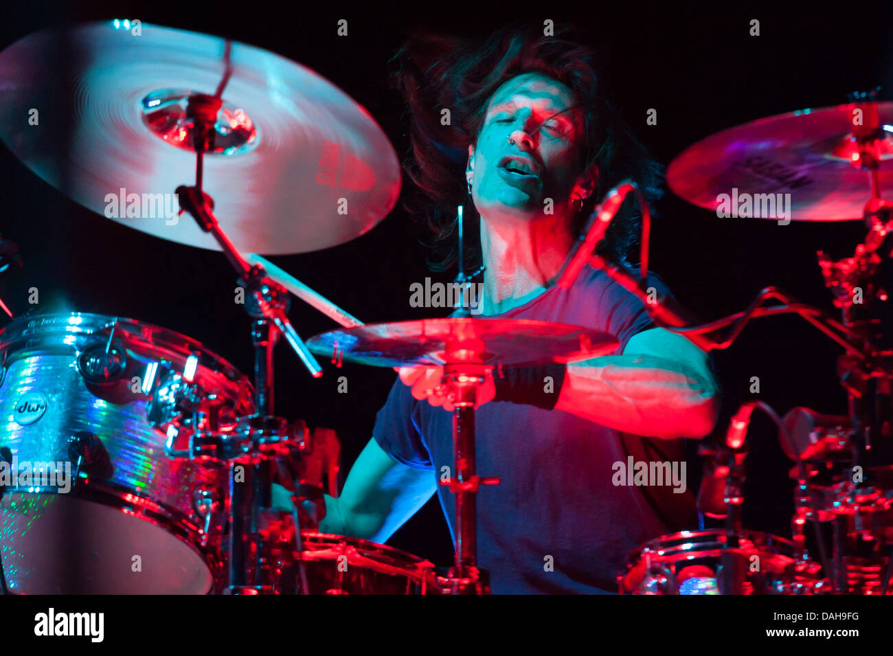London Ontario, Canada. Alice In Chains drummer Sean Kinney performs with the band during a concert at the Budweiser Gardens in London Ontario, Canada on July 11, 2013.  Formed in the late 1980s the band as often been associated with the 'grunge' movement that was emerging at the time. Credit:  Mark Spowart/Alamy Live News Stock Photo