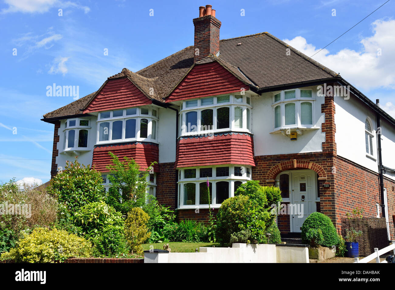 Semidetached houses, Manor Road, WaltononThames, Surrey, England
