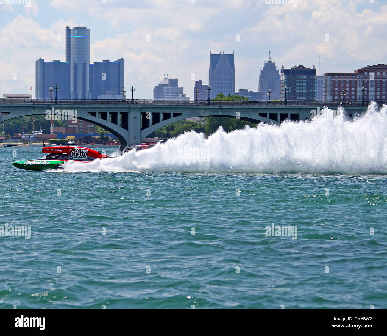 Detroit, MI, USA. 13th July, 2013. Steve David (1) pilots his Oh Boy! Oberto boat past the Belle Isle bridge and the Detroit skyline during heat 1a on the Detroit River on July 13, 2013 in Detroit, Michigan. Tom Turrill/CSM/Alamy Live News Stock Photo