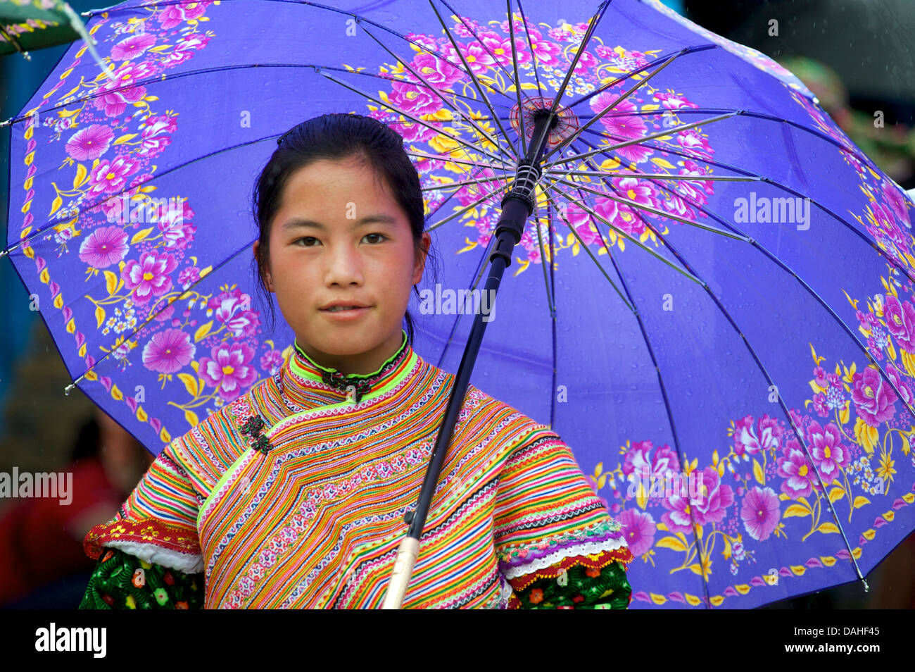 Vietnamese Flower Hmong girl with umbrella at Bac Ha market Stock Photo Alamy