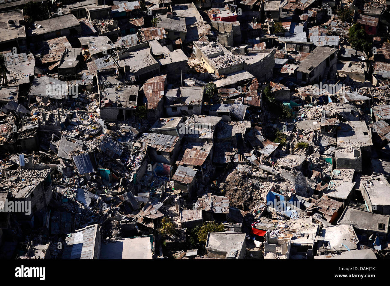Aerial view the ruins and destruction of a crowded slum in the aftermath of a 7.0 magnitude earthquake that killed 220,000 people January 28, 2010 in Port-au-Prince, Haiti. Stock Photo