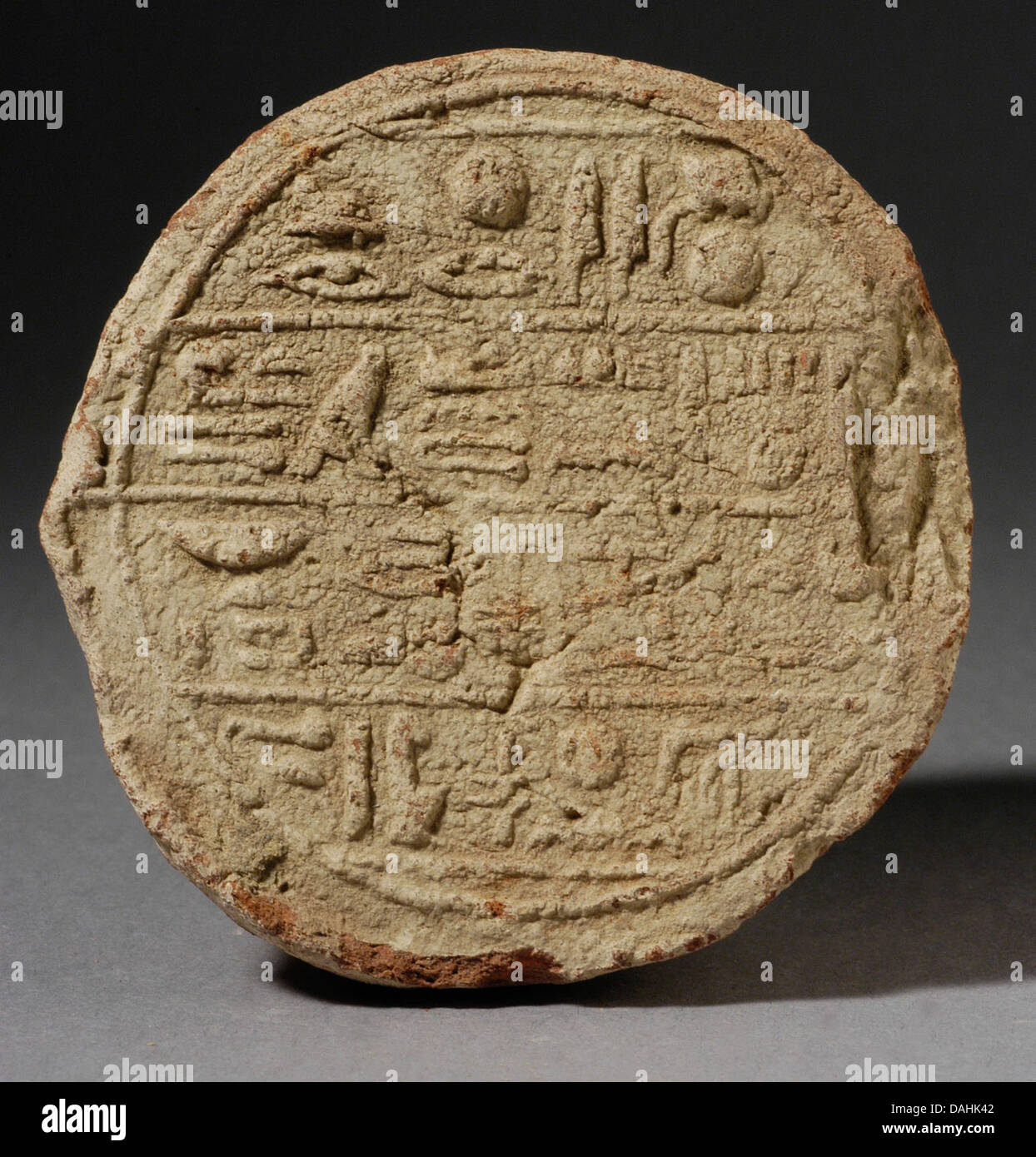 Funerary cone of Montuemhat, an ancient Egyptian object used in tombs, made of limestone. It features inscriptions of Montuemhat, a powerful official during the 25th Dynasty. Displayed in LACMA's Egyptian Art collection, it highlights Egypt's funerary practices. Stock Photo