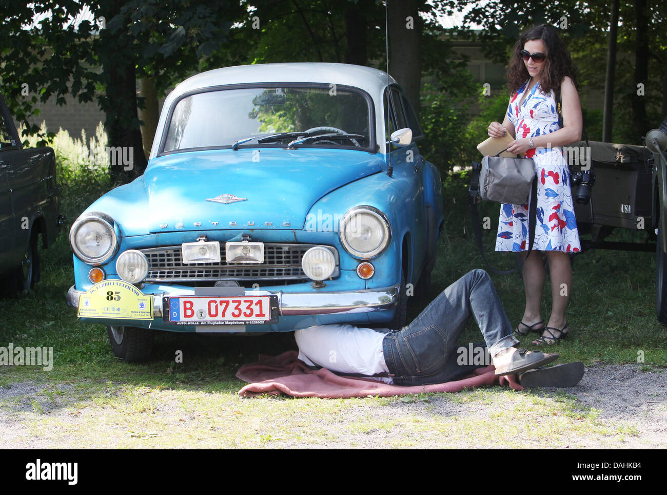 A Wartburg 311 from 1953 is repaired during the 'Curbici-Veterano' classic car rally in Zoerbig, Germany, 13 July 2013. The classic vehichle show takes place on 13 and 14 July 2013. Photo: SEBASTIAN WILLNOW Stock Photo
