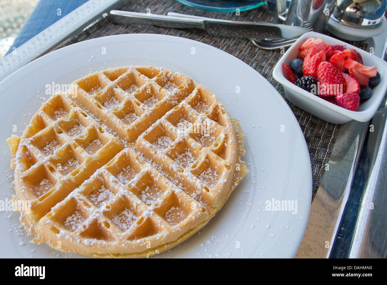 Waffles on a room service tray in a luxury hotel Stock Photo Alamy
