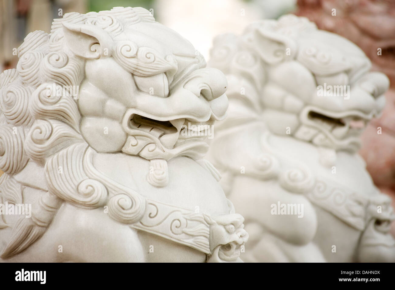 Stone carving of temple guardian. En route between Hanoi and Halong. Vietnam Stock Photo