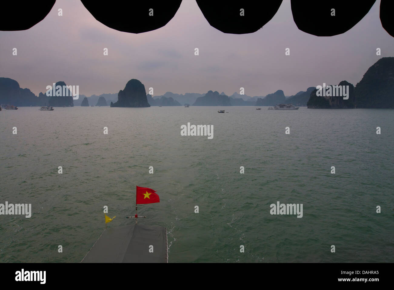 View from cruise ship, Halong Bay, Vietnam Vietnamese National flag