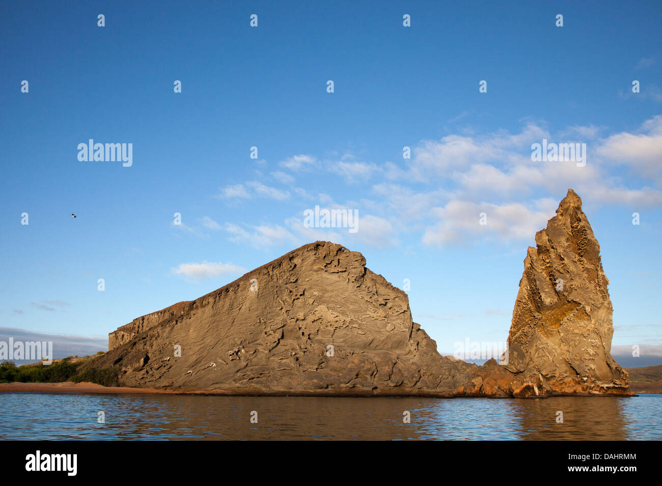 Pinnacle Rock on Bartolome Island, the remnant of an eroded volcanic tuff cone in the Galapagos Islands Stock Photo