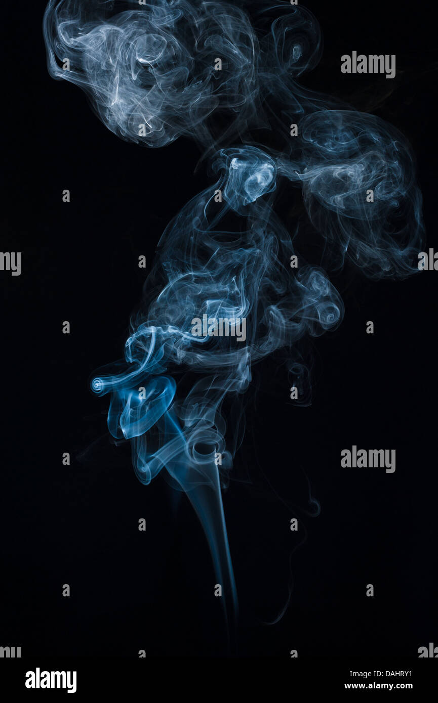 Moving smoke on a black background Stock Photo - Alamy