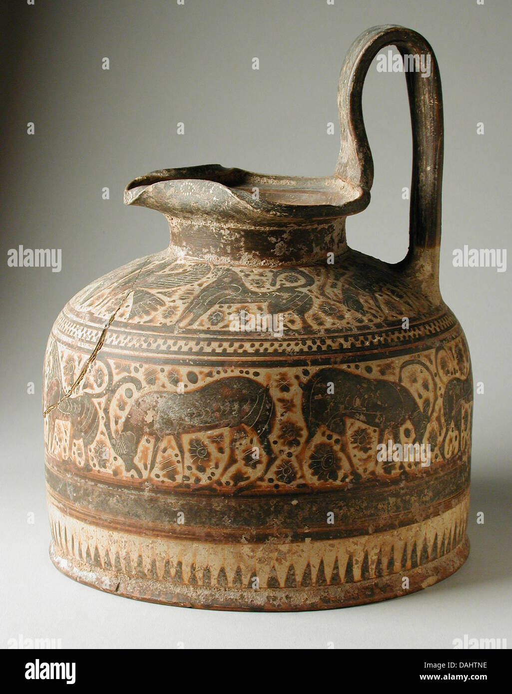 A squat oinochoe, a type of ancient Greek pottery, featured in the ...