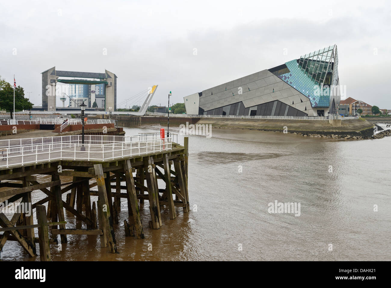 The Victoria Pier Flood Barrier and The Deep in the docks area of Hull UK Stock Photo