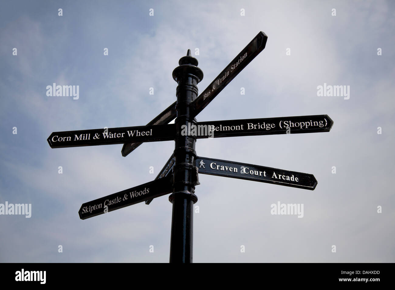 Finger-post signposts Metal street signs to different destinations in the town of Skipton, North Yorkshire, UK Stock Photo