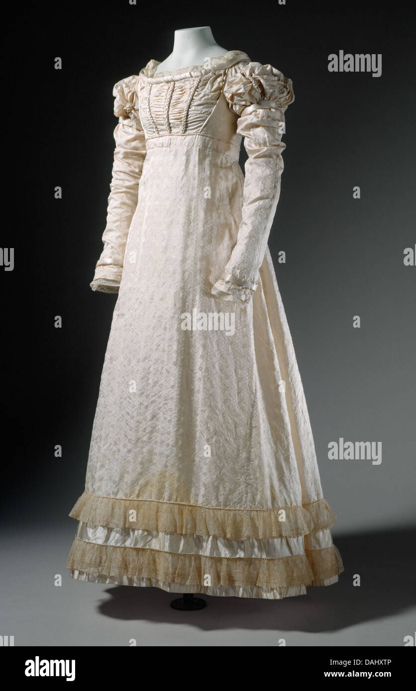 This dress represents a historical example of fashion, showcasing the ...