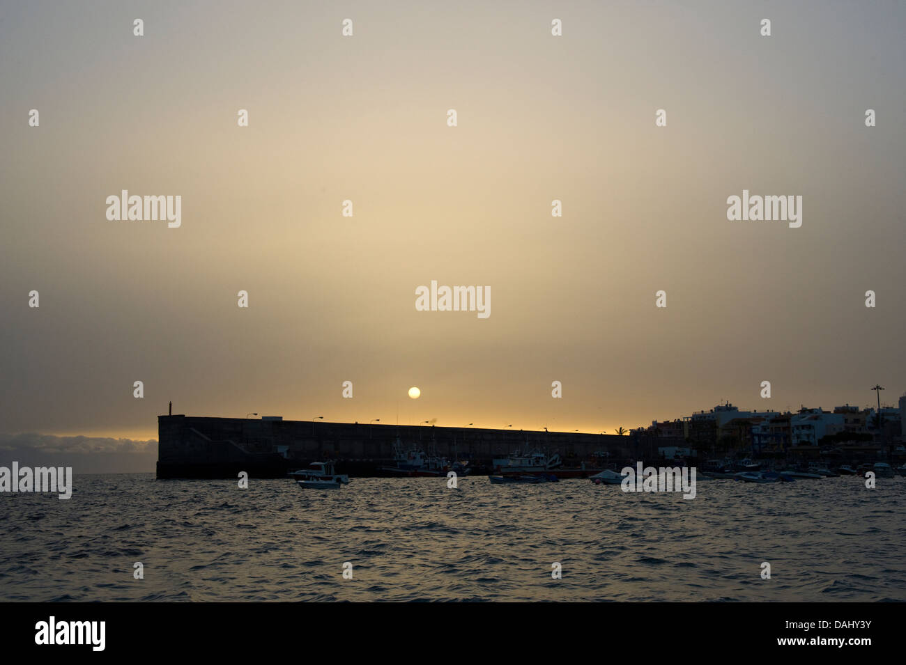 Tenerife, Canary Islands San Miguel De Abona harbour wall at dawn, Spain Stock Photo