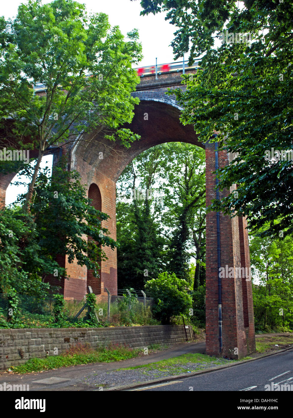 View of Dollis Brook Viaduct, the highest point on the London Underground network showing the Northern Line in transit Stock Photo