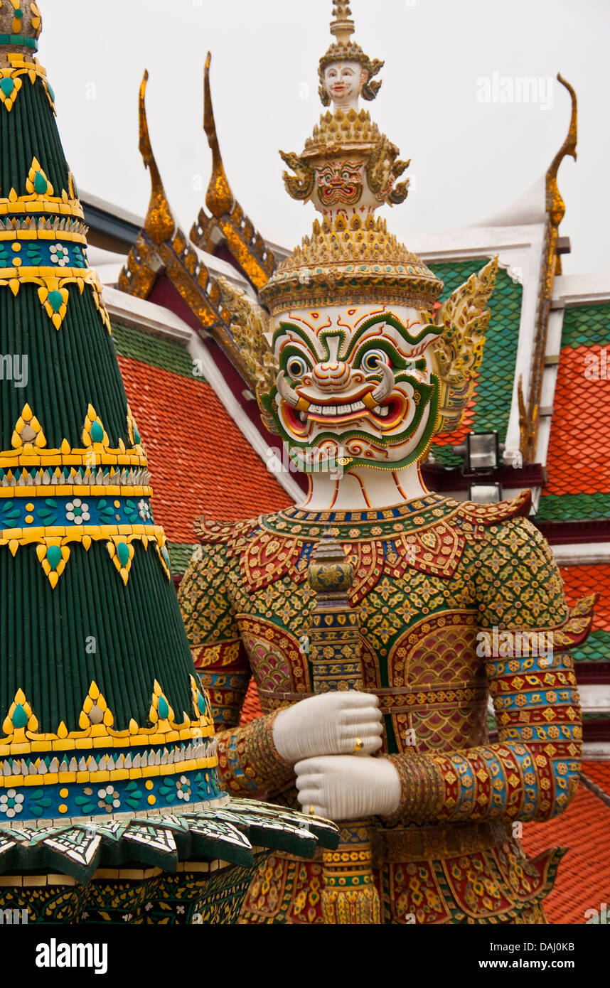 Giant demon (yaksha) statue guarding Wat Phra Kaew in Grand Palace in