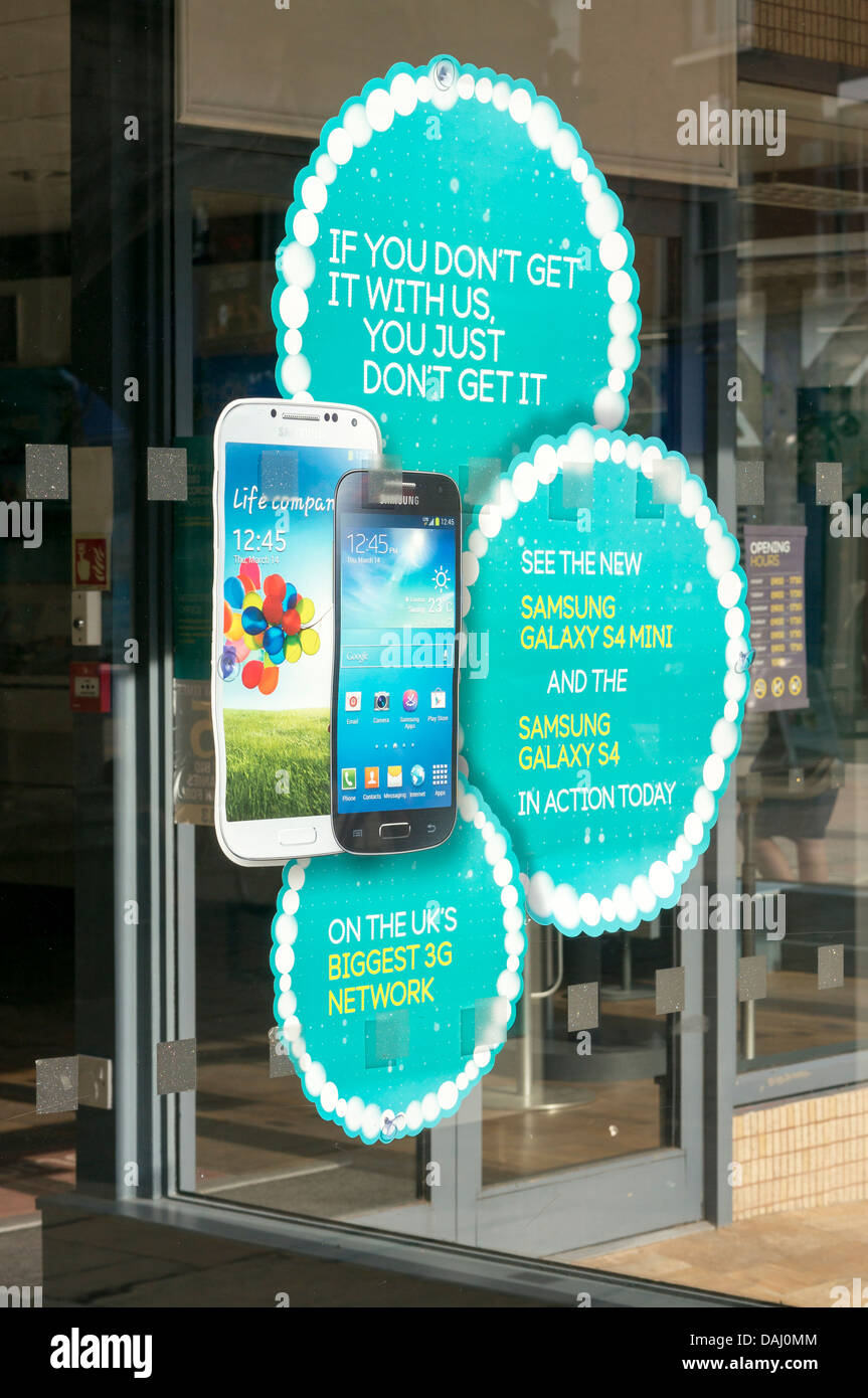 Samsung mobile phone advertising poster in shop window Stock Photo