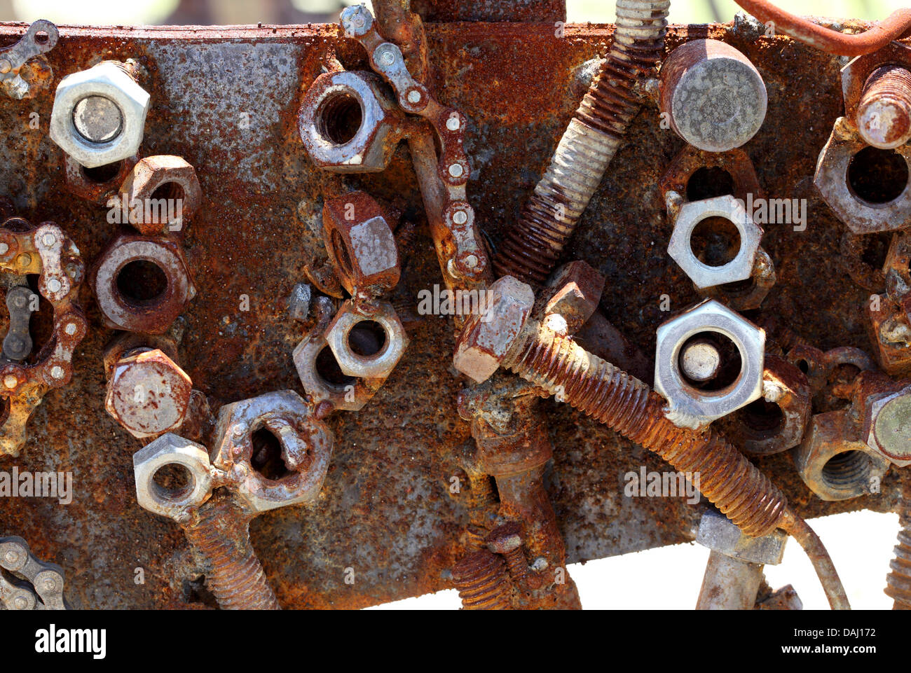 Rusty bolts and nuts on an old machinery Stock Photo