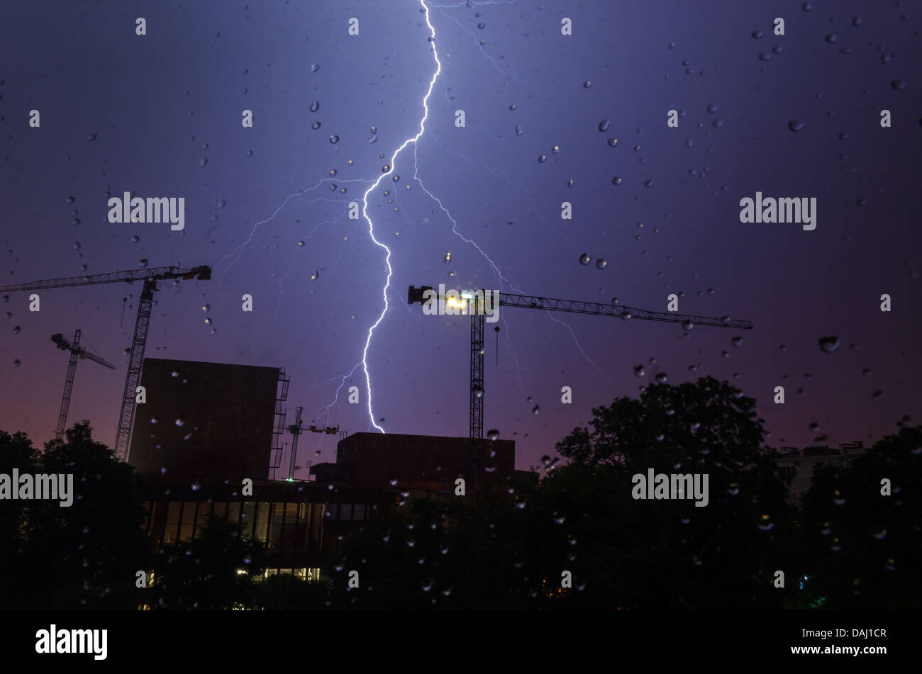 Lightning, Raindrops and Construction Stock Photo