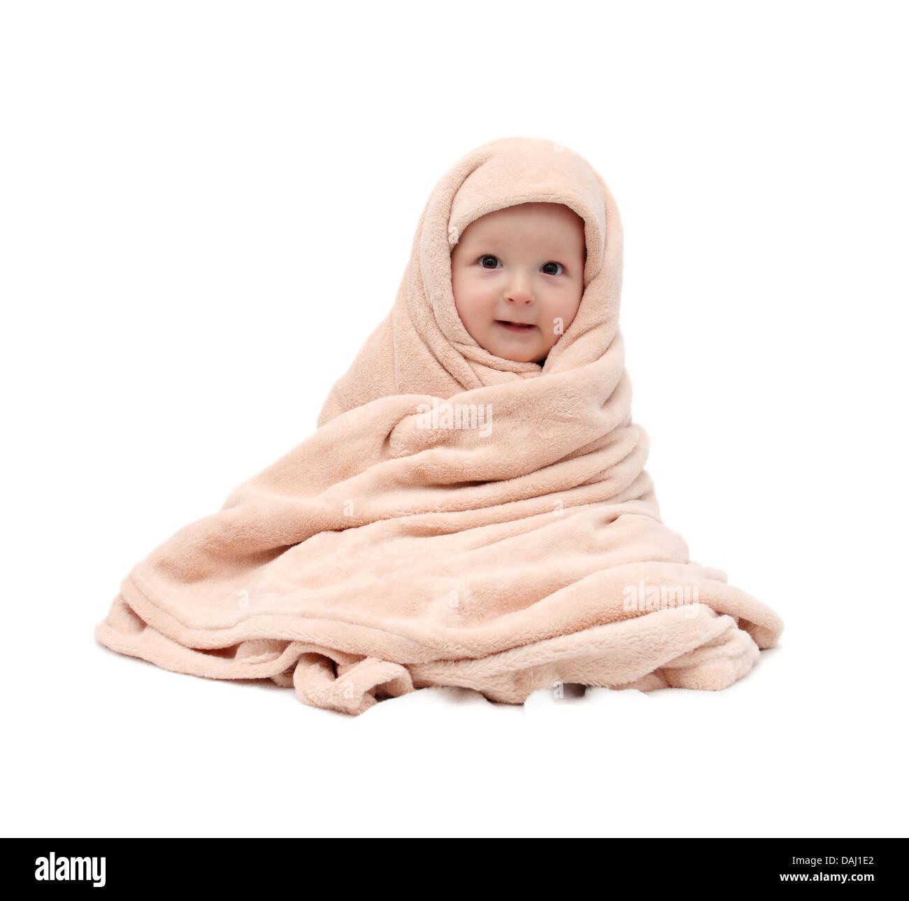 baby after bath sitting on bed Stock Photo