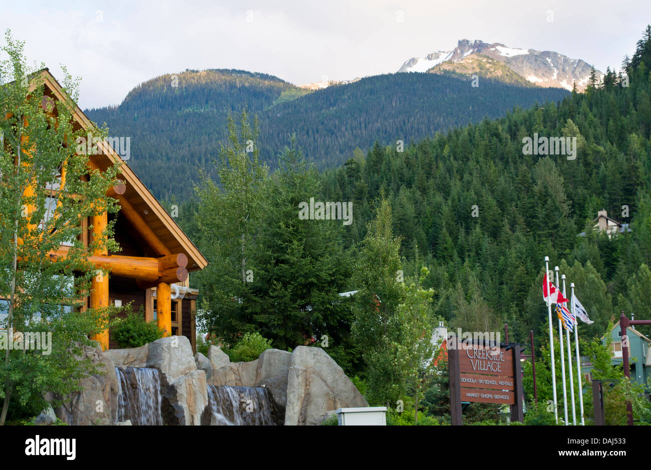 Log building and mountain view at Creekside in Whistler, British Columbia Canada. Stock Photo