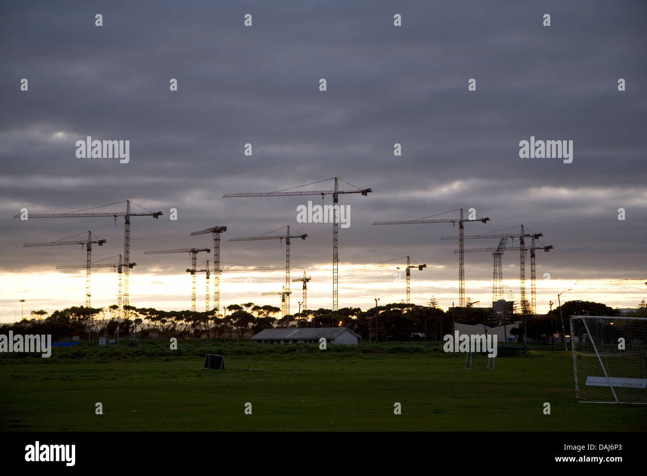 Seen soccer fields in Greenpoint construction cranes rise above site
