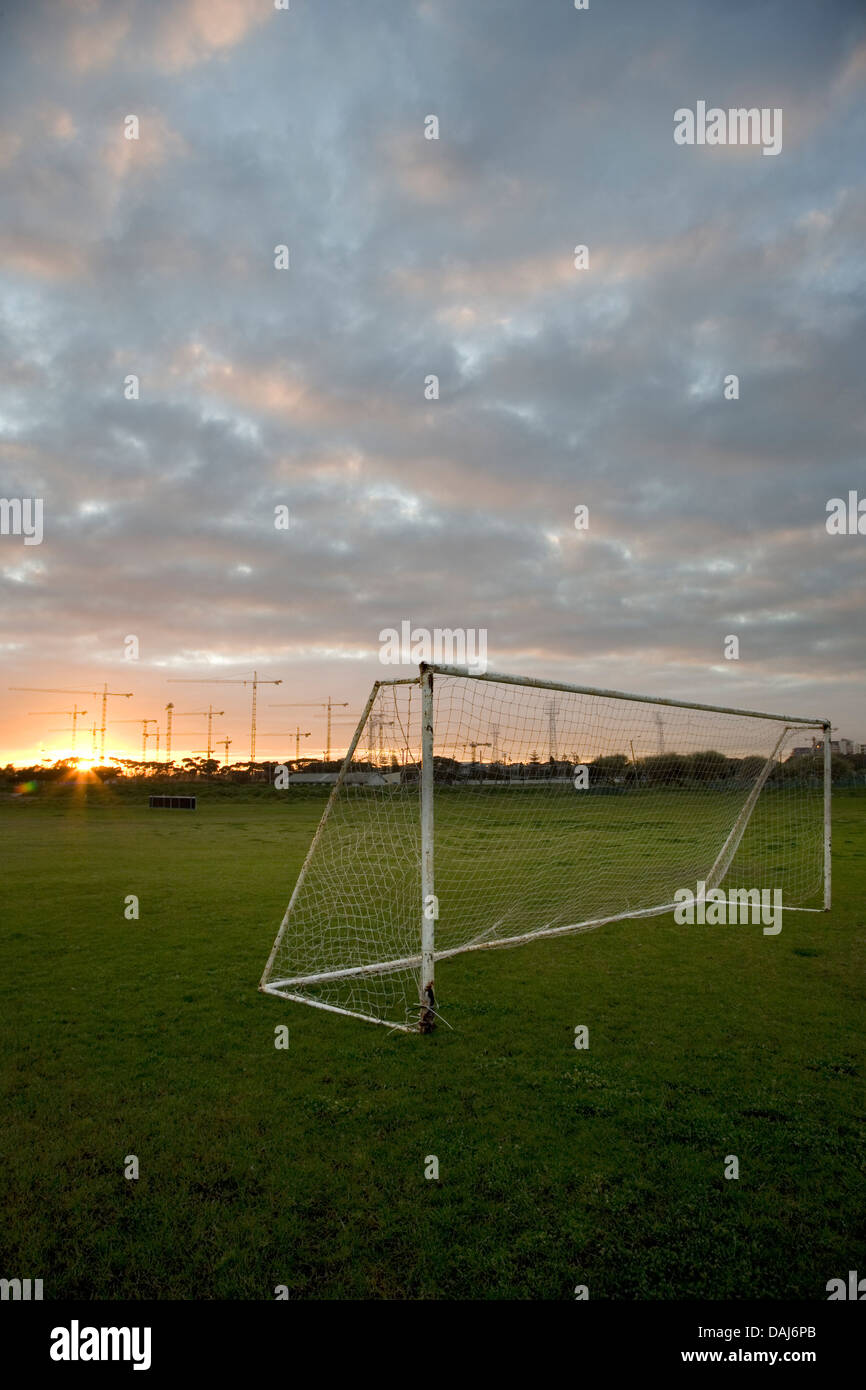 Seen soccer fields in Greenpoint construction cranes rise above site