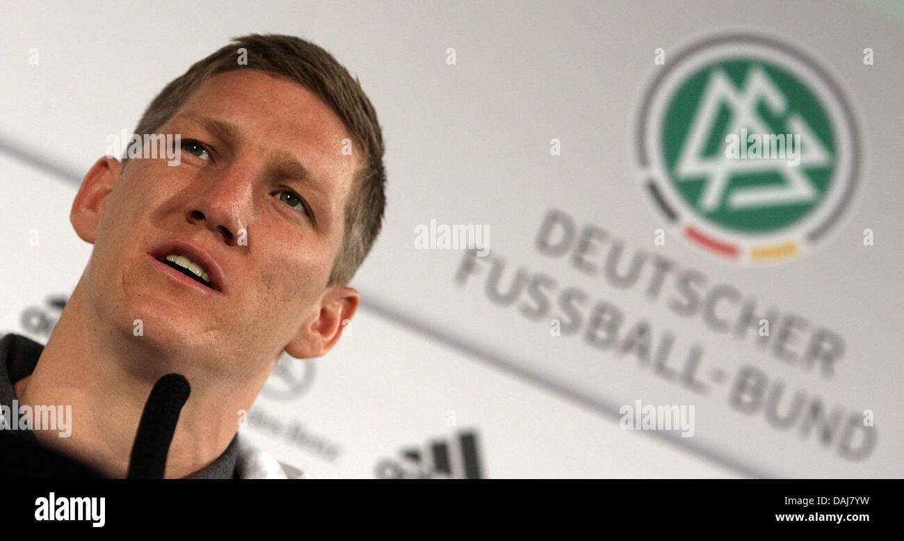 German national soccer player Bastian Schweinsteiger speaks during a press conference of the national team at the Electoral Palace in Mainz, Germany, 24 March 2011. The German team faces Kazakhstan in a qualifying match of the UEFA European Football Championships on 26 March 2011. Photo: Fredrik Von Erichsen Stock Photo