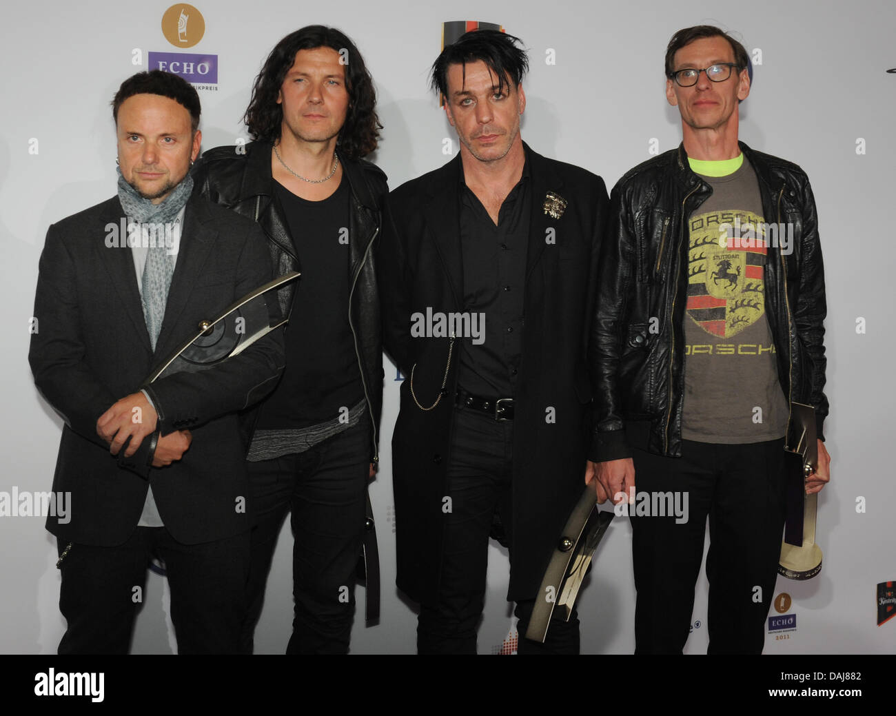German band Rammstein poses with the 2011 Echo Music Award in the category 'Best  video national' at the 20th Echo Awards ceremony in Berlin, Germany, 24  March 2011. The Echo Music Award