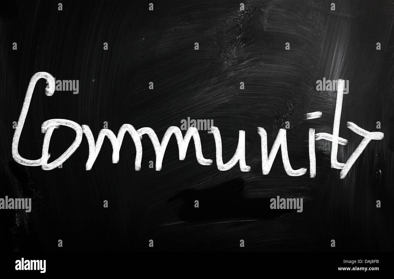 Community handwritten with white chalk on a blackboard Stock Photo - Alamy