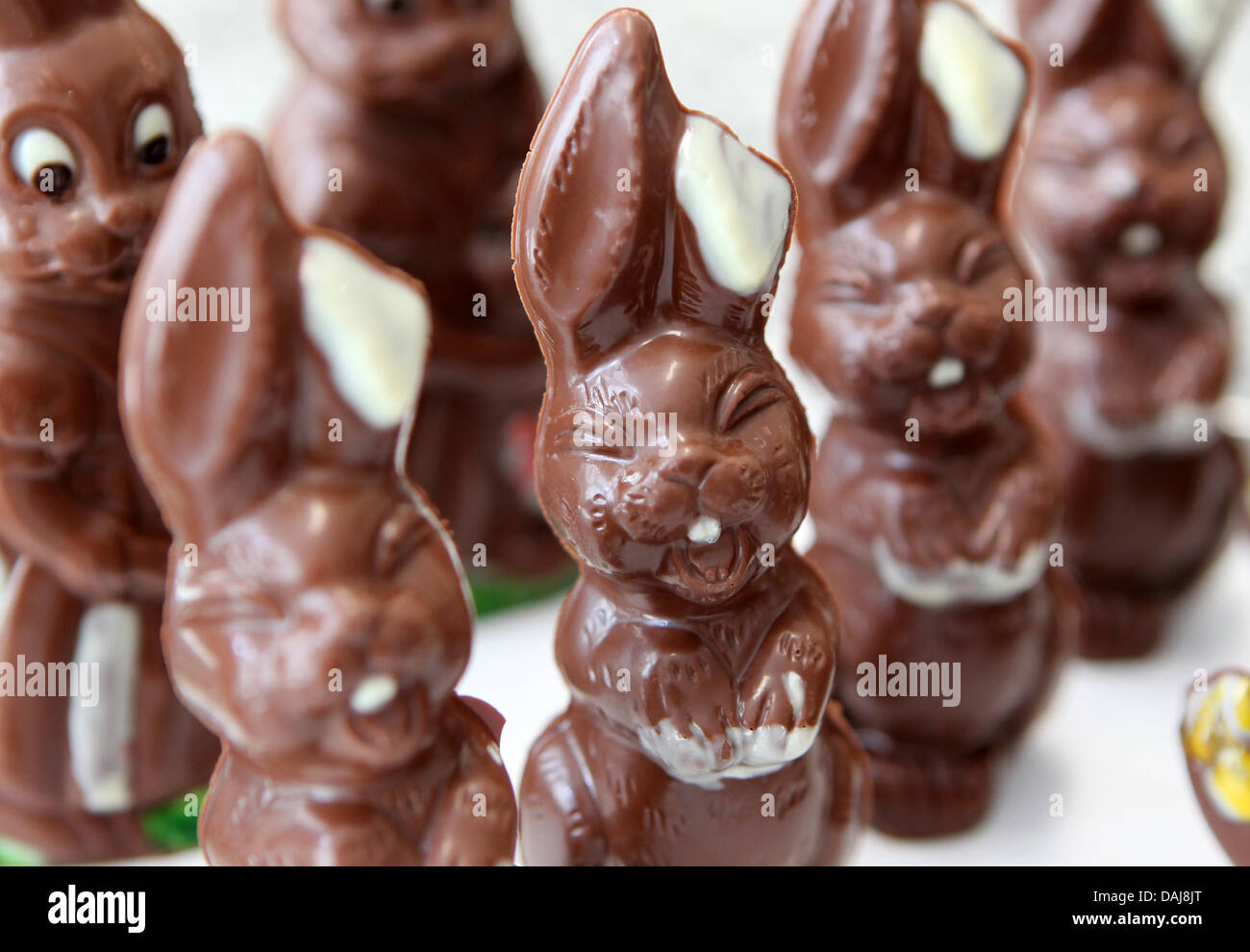 Easter bunnies made of chocolate stand on display at the chocolate shop