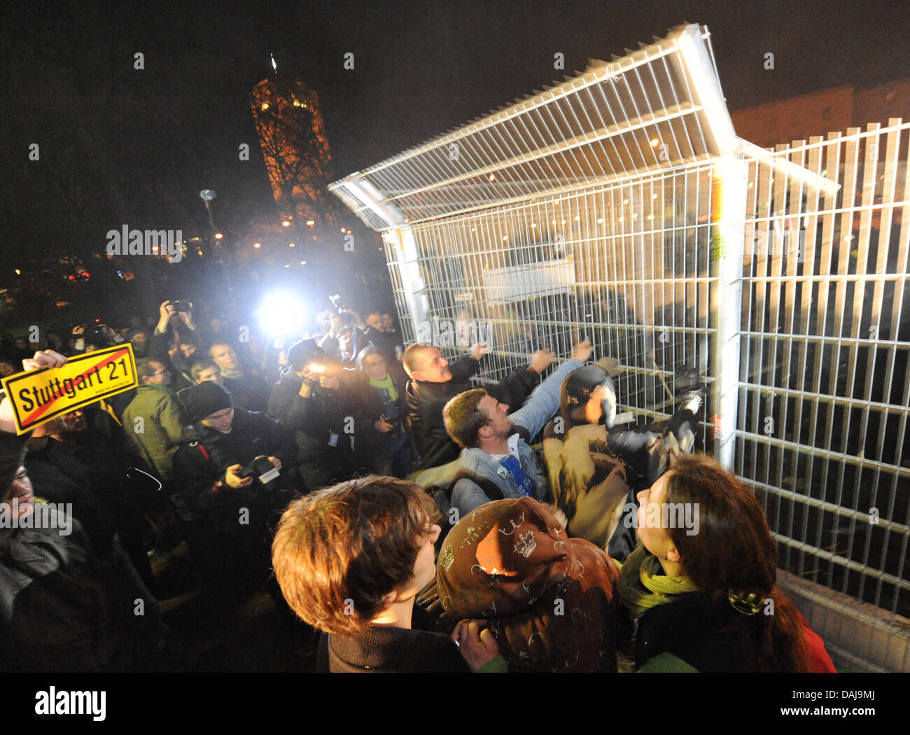 Protesters against disputed Stuttgart 21 construction project attack the construction site in Stuttgart, Germany, 27 March 2011. Buoyed by the outcomes of Baden-Wuerttemberg state elections, people rioted at the site. Photo: Marc Mueller Stock Photo