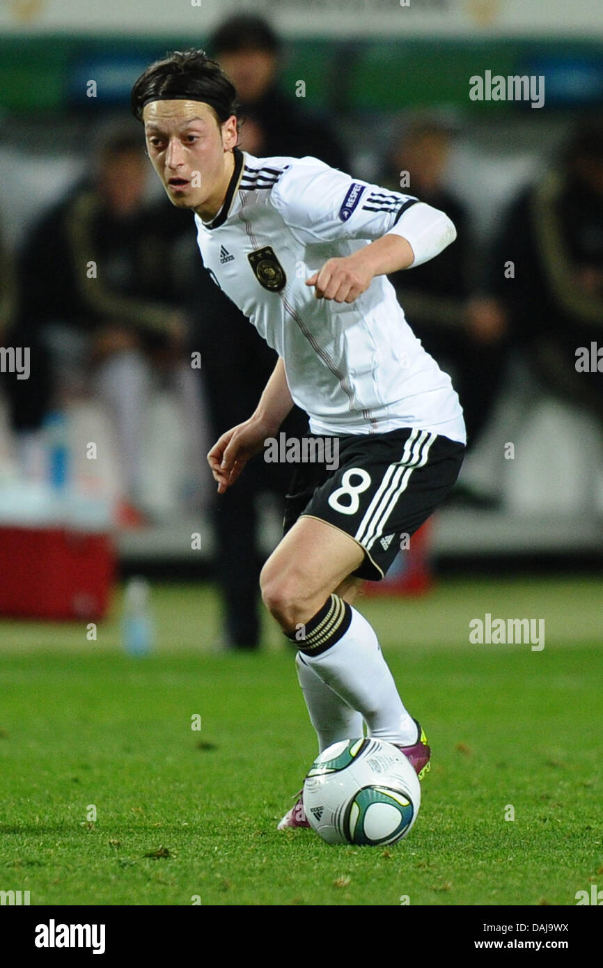 Germany's Mesut Ozil contrlls the ball during UEFA Euro 2012