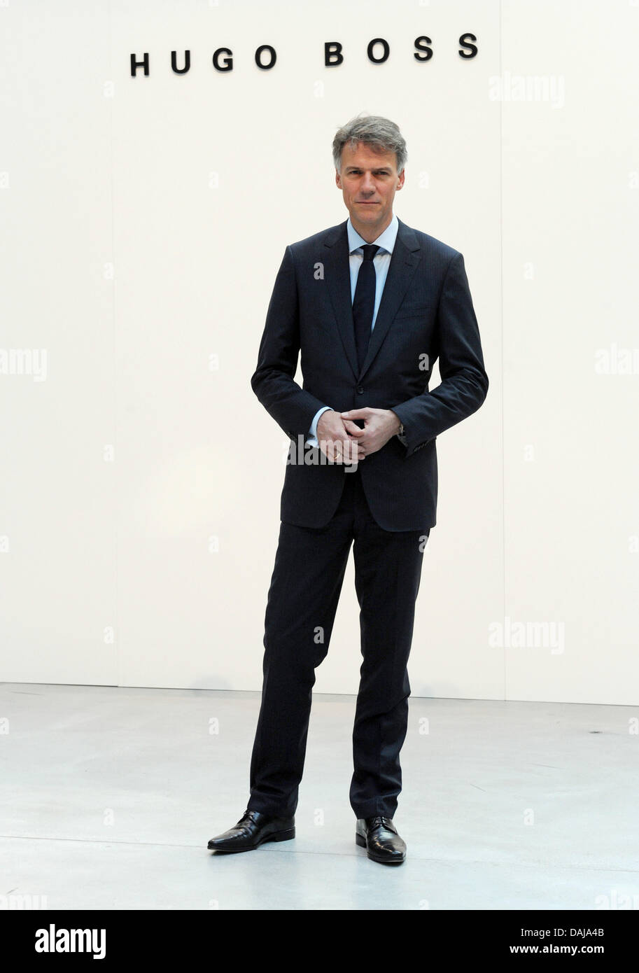 Hugo Boss CEO Claus-Dietrich Lahrs smiles before the fashion company's  balance press conference in Metzingen, Germany, 29 March 2011. Hugo Boss  reports a plus of eleven per cent in turnover to 1.72