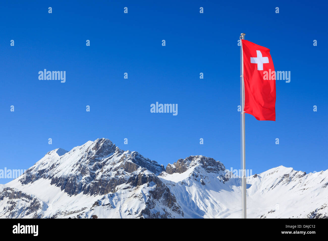 swiss-flag-in-front-of-swiss-alps-hi-res-stock-photography-and-images