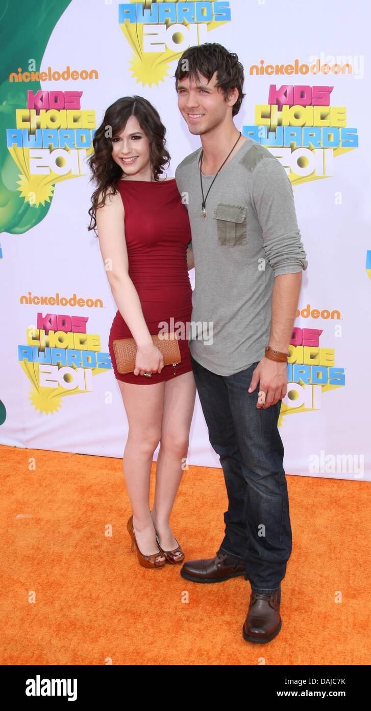 Actress Erin Sanders and date attend the Nickelodeon Kids' Choice Awards at Galen Center in Los Angeles, USA, 02 April 2011. Photo: Hubert Boesl Stock Photo