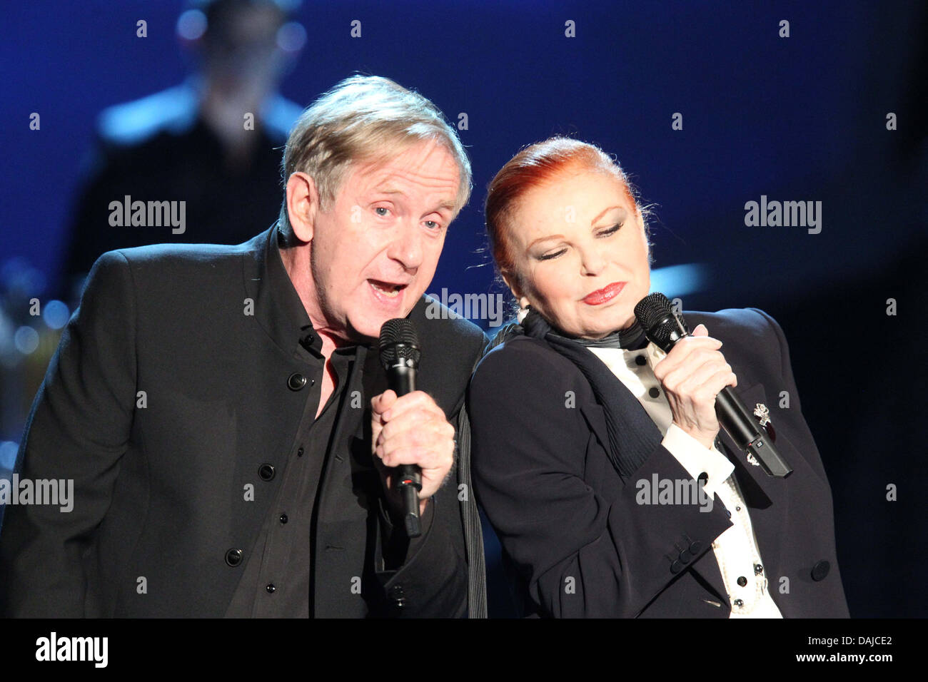 Swiss song writer Stephan Sulke (L) and Italian singer Milva perform during the German television show 'Willkommen bei Carmen Nebel' ('Welcome to Carmen Nebel's show') aired by the German public tv broadcaster ZDF in Klagenfurt, Austria, 2 April 2011. Numerous German and international stars perform at popular German variety and entertainment show. Photo:  Stock Photo