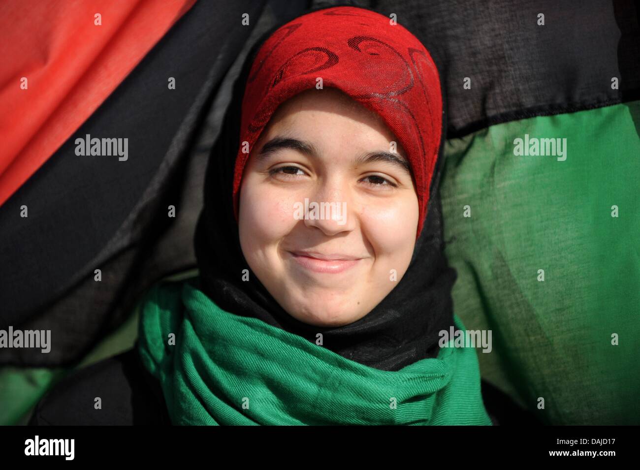 A young Libyan wears the colours of the revolution against Gaddafi in Benghazi, Libya, 5 April 2011. In the war against  the Libyan leader Muammar Gaddafi a decision cannot be predicted yet. Photo: Maurizio Gambarini Stock Photo