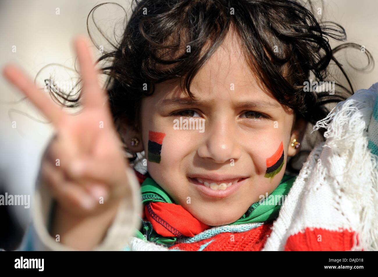 A young Libyan wears the colours of the revolution against Gaddafi in Benghazi, Libya, 5 April 2011. In the war against  the Libyan leader Muammar Gaddafi a decision cannot be predicted yet. Photo: Maurizio Gambarini Stock Photo